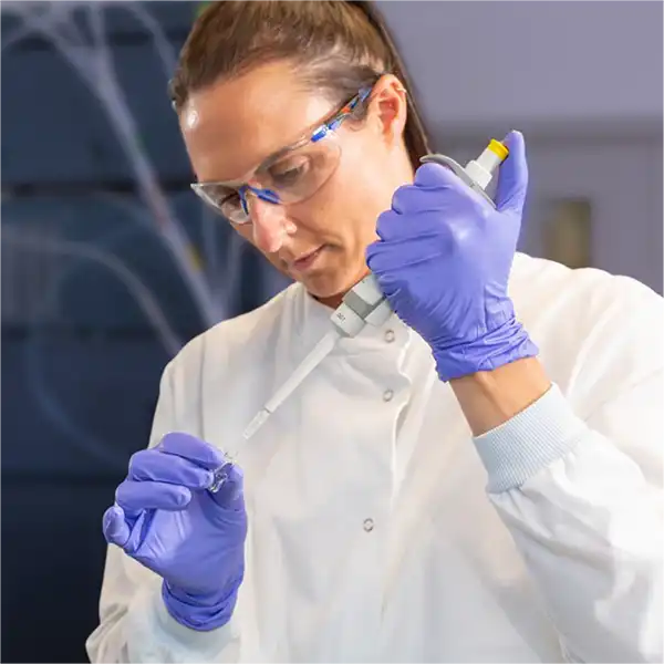 Drug development researcher working in the lab