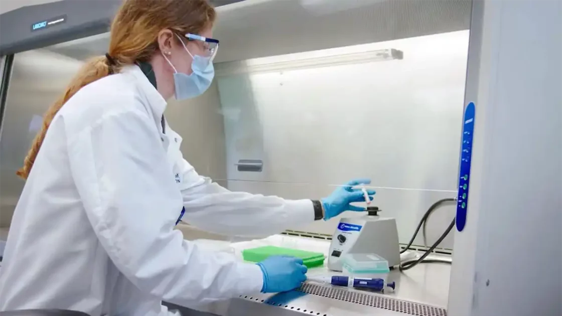 Researcher working with radiolabelled compounds