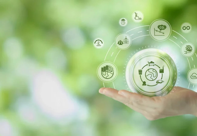 renewable energy, and carbon reduction, against a blurred leafy background.