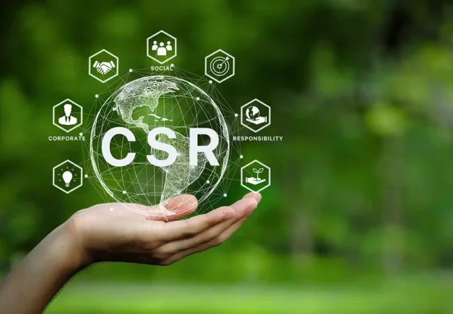 Open hand holding a glowing globe labeled "CSR" with interconnected icons representing corporate social responsibility, sustainability, and ethics.